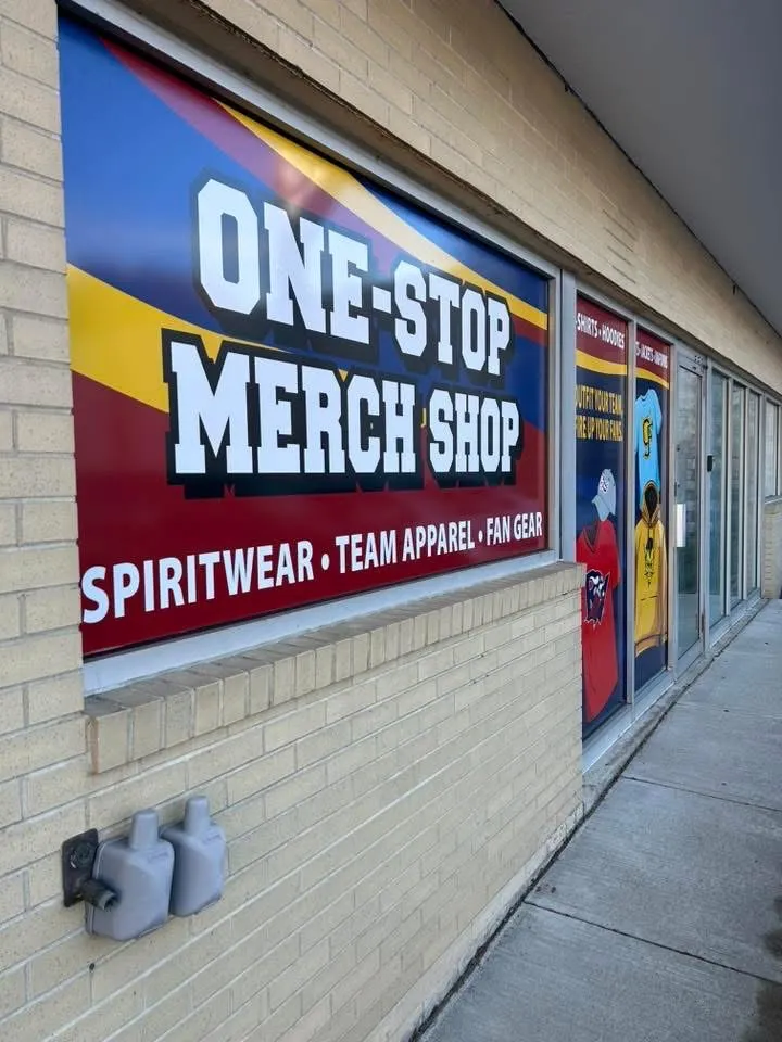 One-Stop Merch Shop window sign at T Shirts in 24