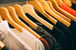 row of t-shirts on hangers